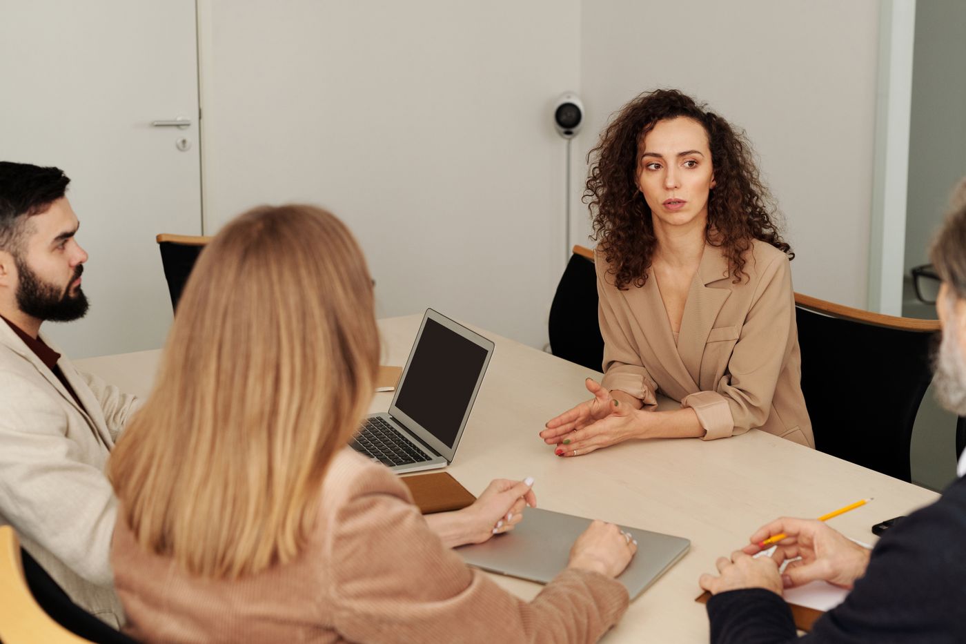 A diverse team collaborating around a table
